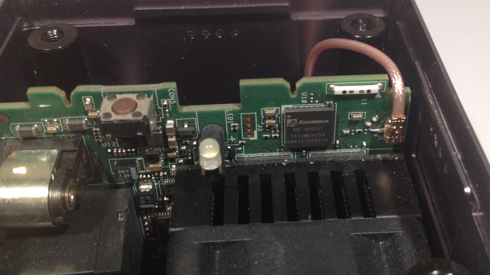Ouya motherboard re-installation with U.FL Connector plugged in.